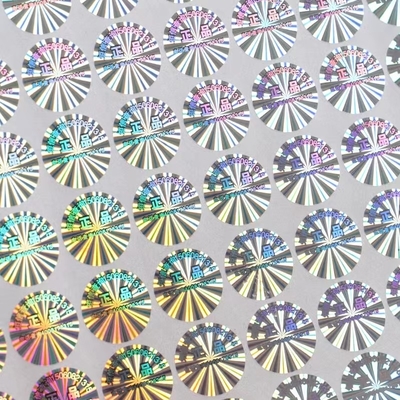 สติกเกอร์โฮโลแกรมสีเงินเลเซอร์ 2D / 3D ต่อต้านการปลอมแปลงรอยขีดข่วนปิดกาว OEM
